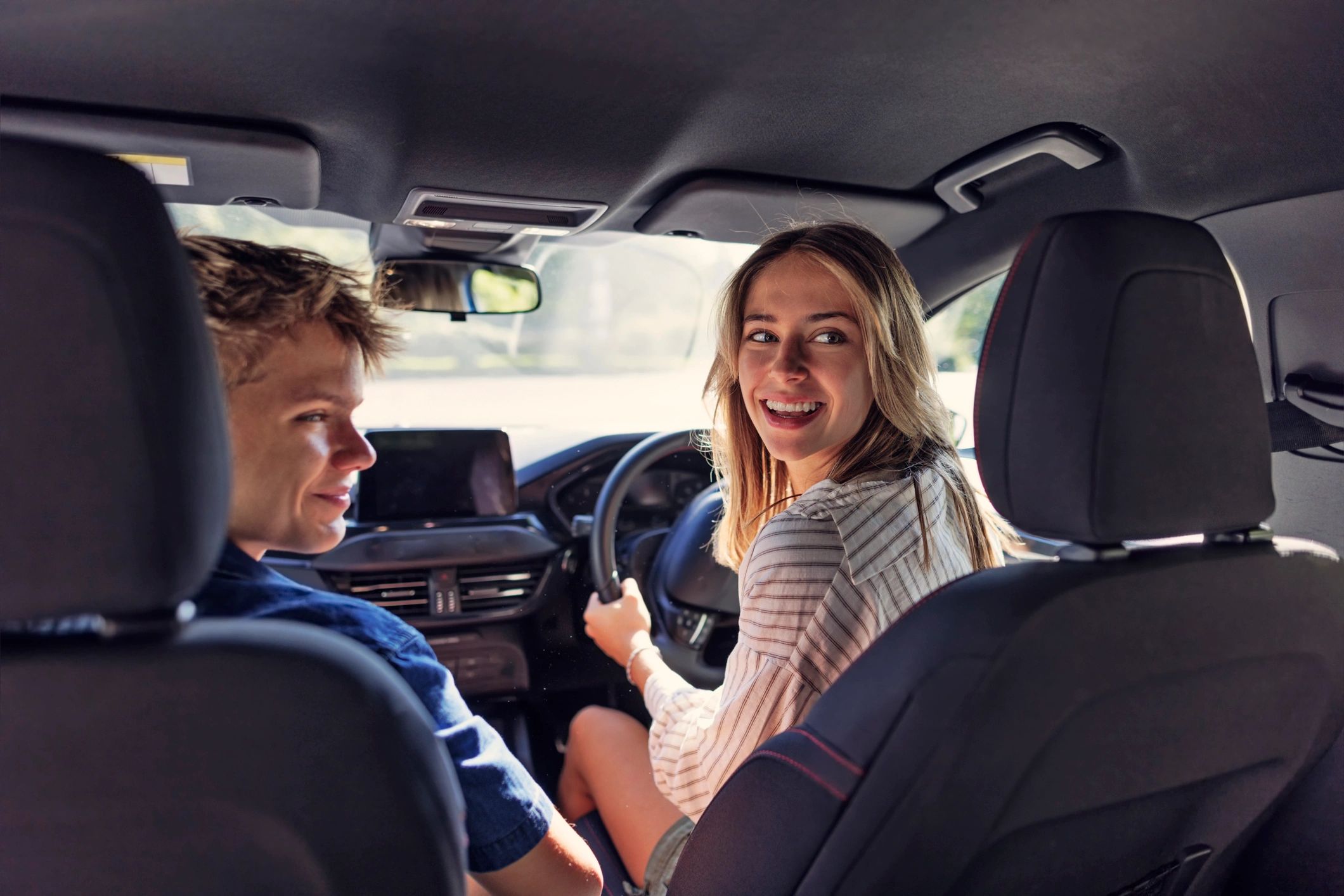 Driving instructor guiding a learner driver during a lesson